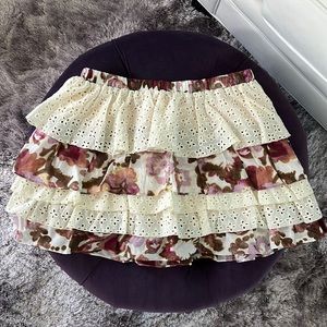 Adorable skirt very flirty layered with eyelet and floral decor fully lined